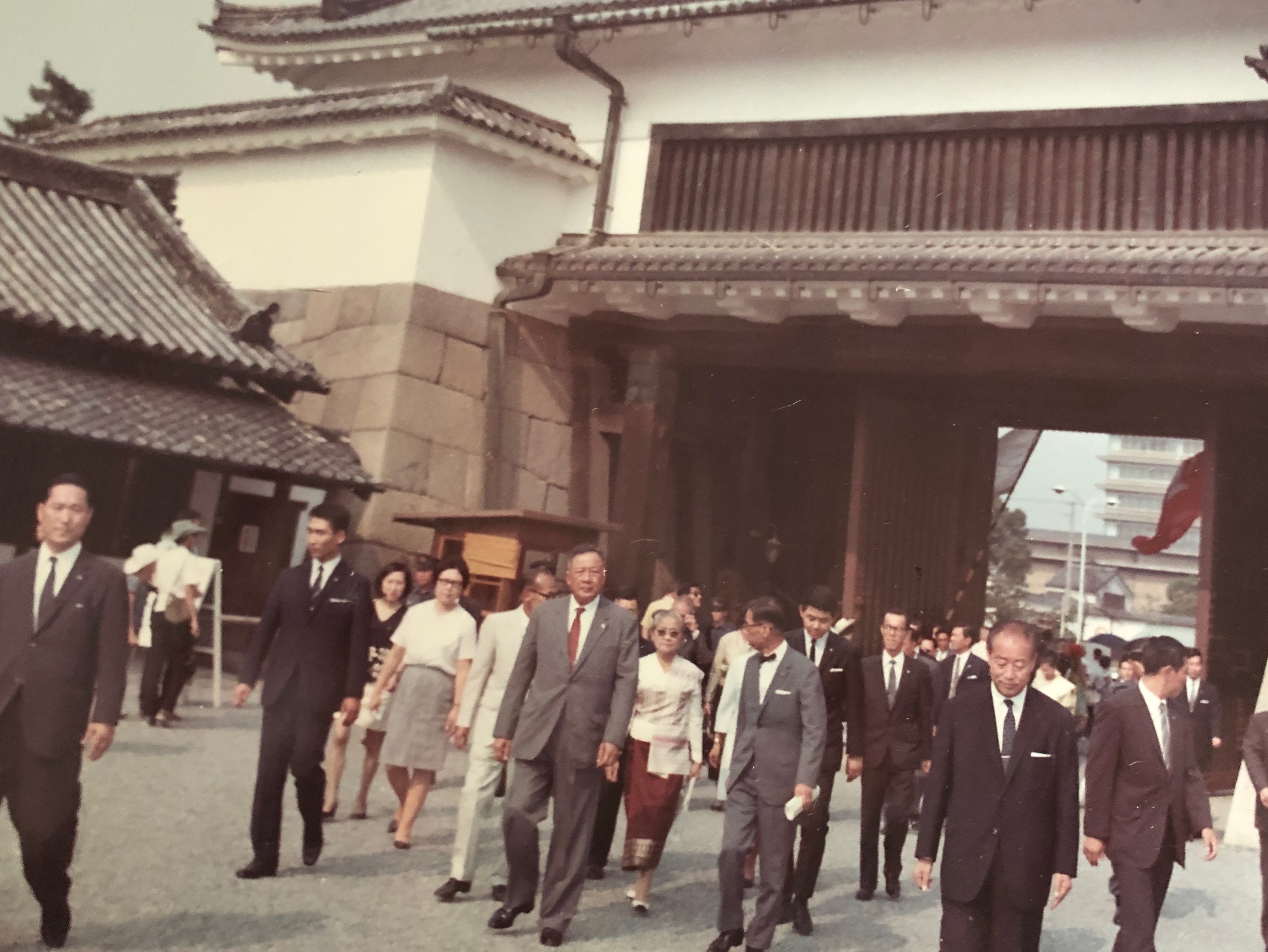 King Savang Vatthana and Queen Khamphouy exiting the Kenreimon gate, Kyoto Imperial Palace